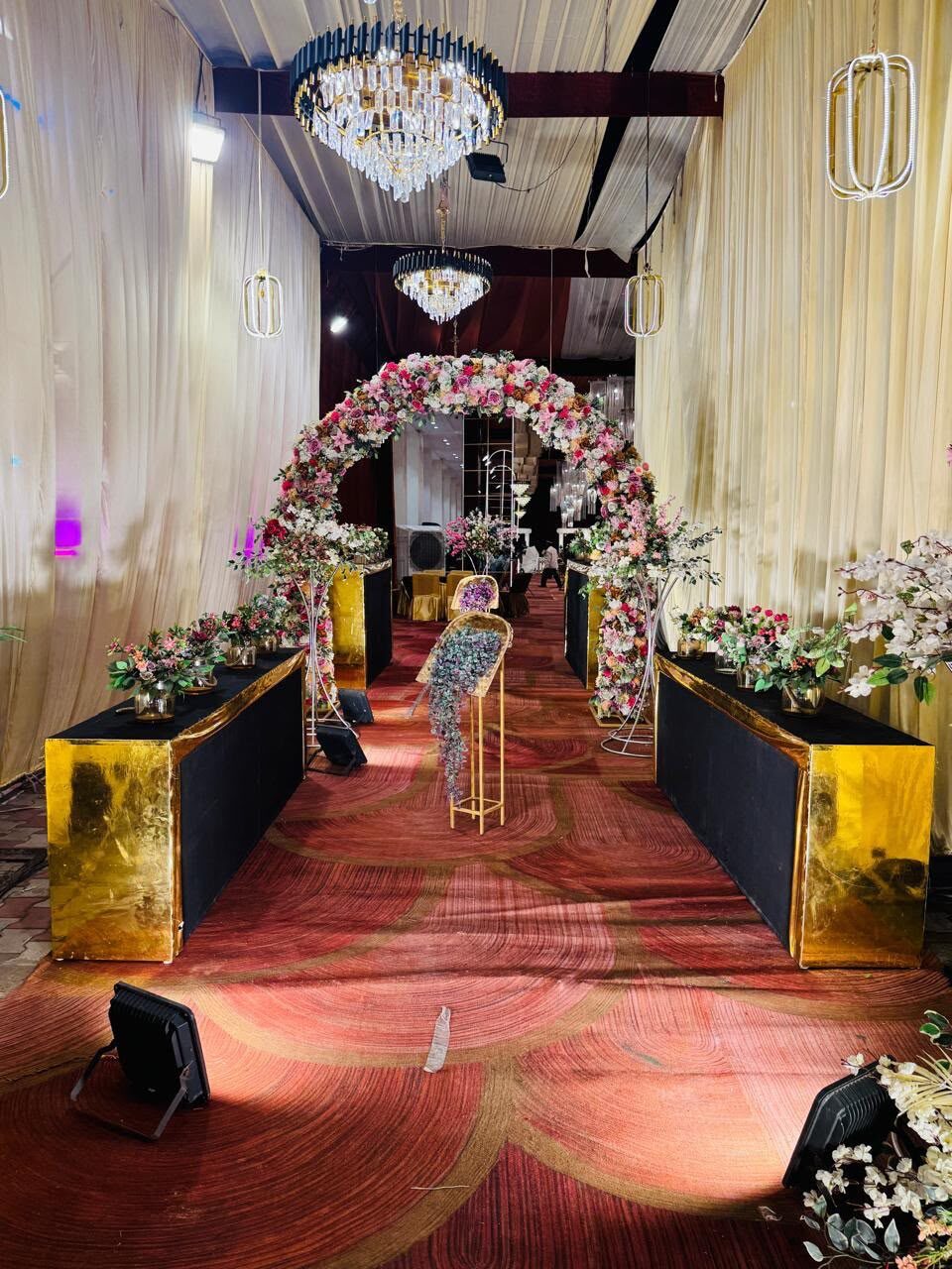 Floral archway aisle